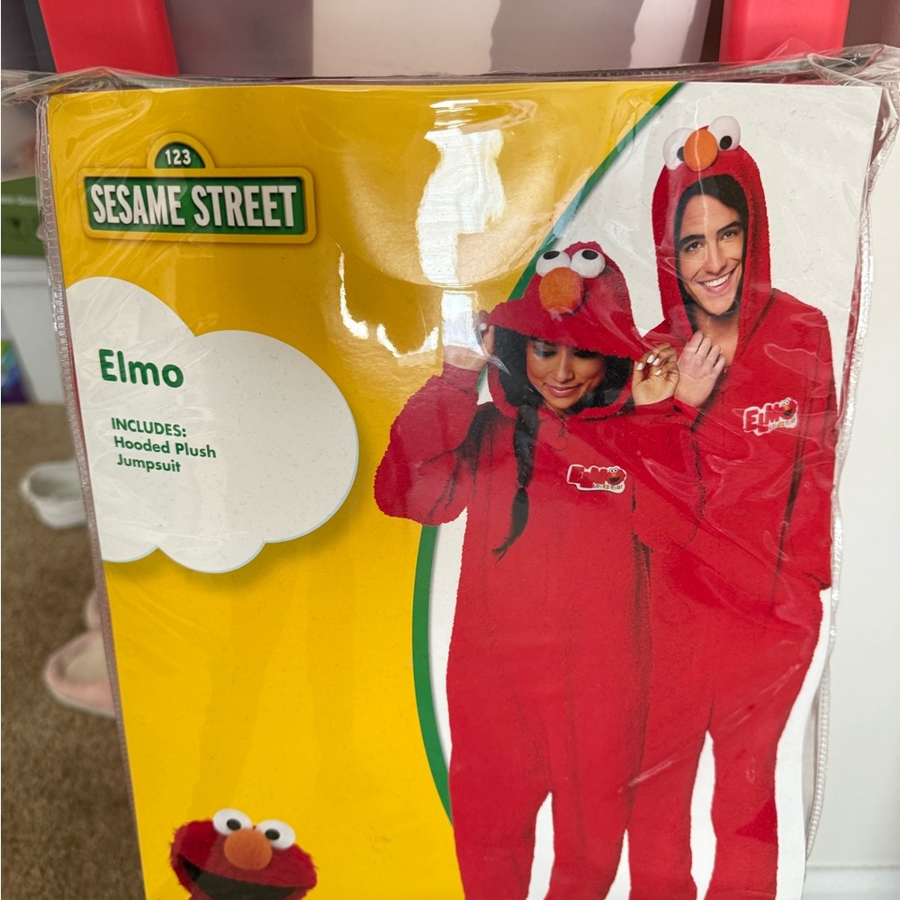 🎉 Sesame Street Elmo Adult Onesie (SM/MD) from Spirit Halloween! 🎉